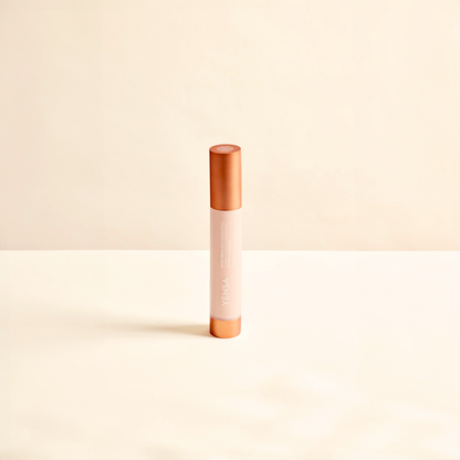 Silk hydrating foundation tube with coral cap and light cream liquid.
