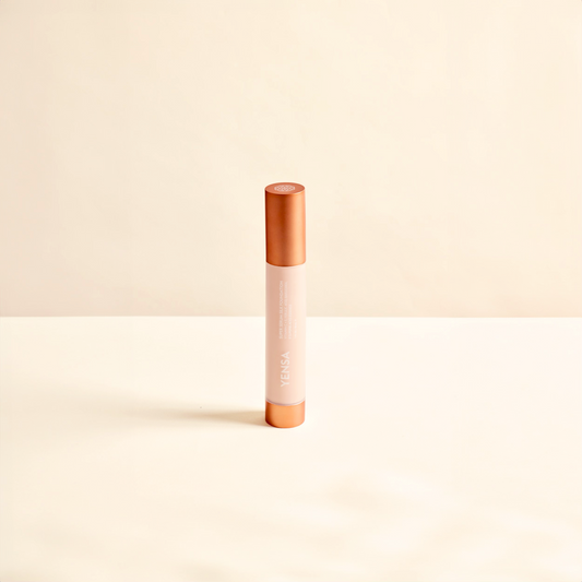 Silk hydrating foundation tube with coral cap and light cream liquid.