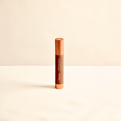 Liquid foundation tube with orange cap and YENSA label