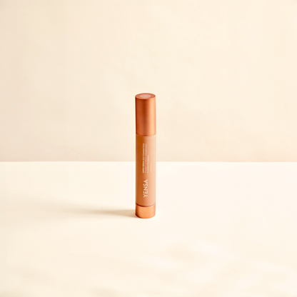 YENSA liquid foundation tube standing upright with orange cap