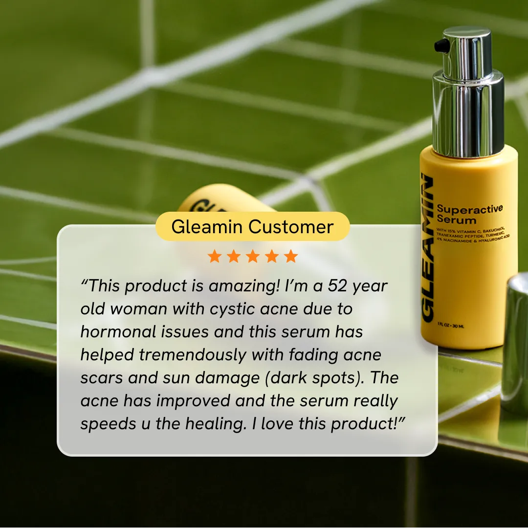 Vitamin C face serum bottle with silver pump top, yellow glass and label