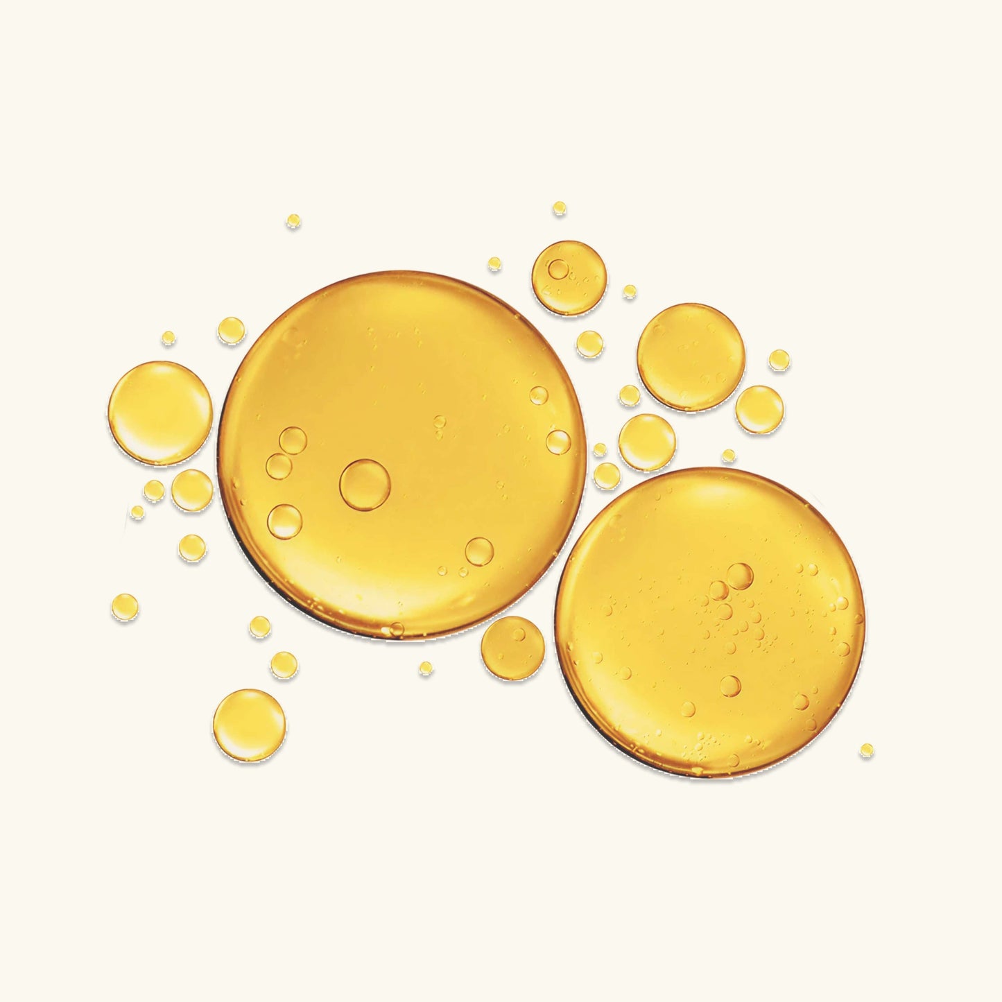 Facial oil droplets and two amber gel discs on a light background