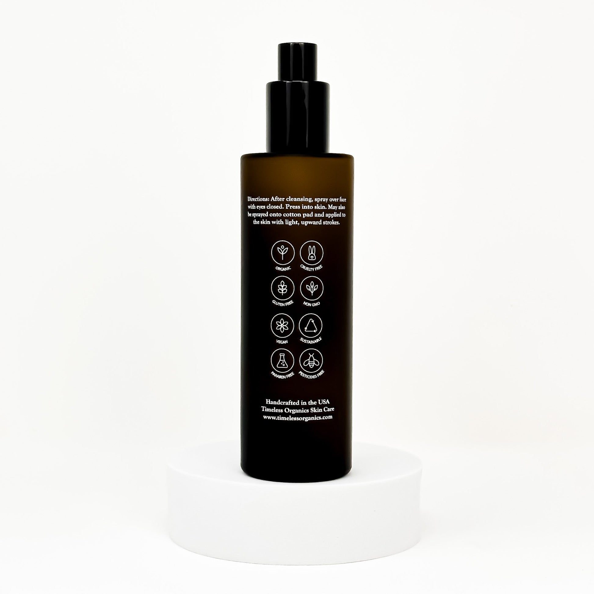 Timeless Organics facial toner bottle, back label with icons, black pump, 100mL