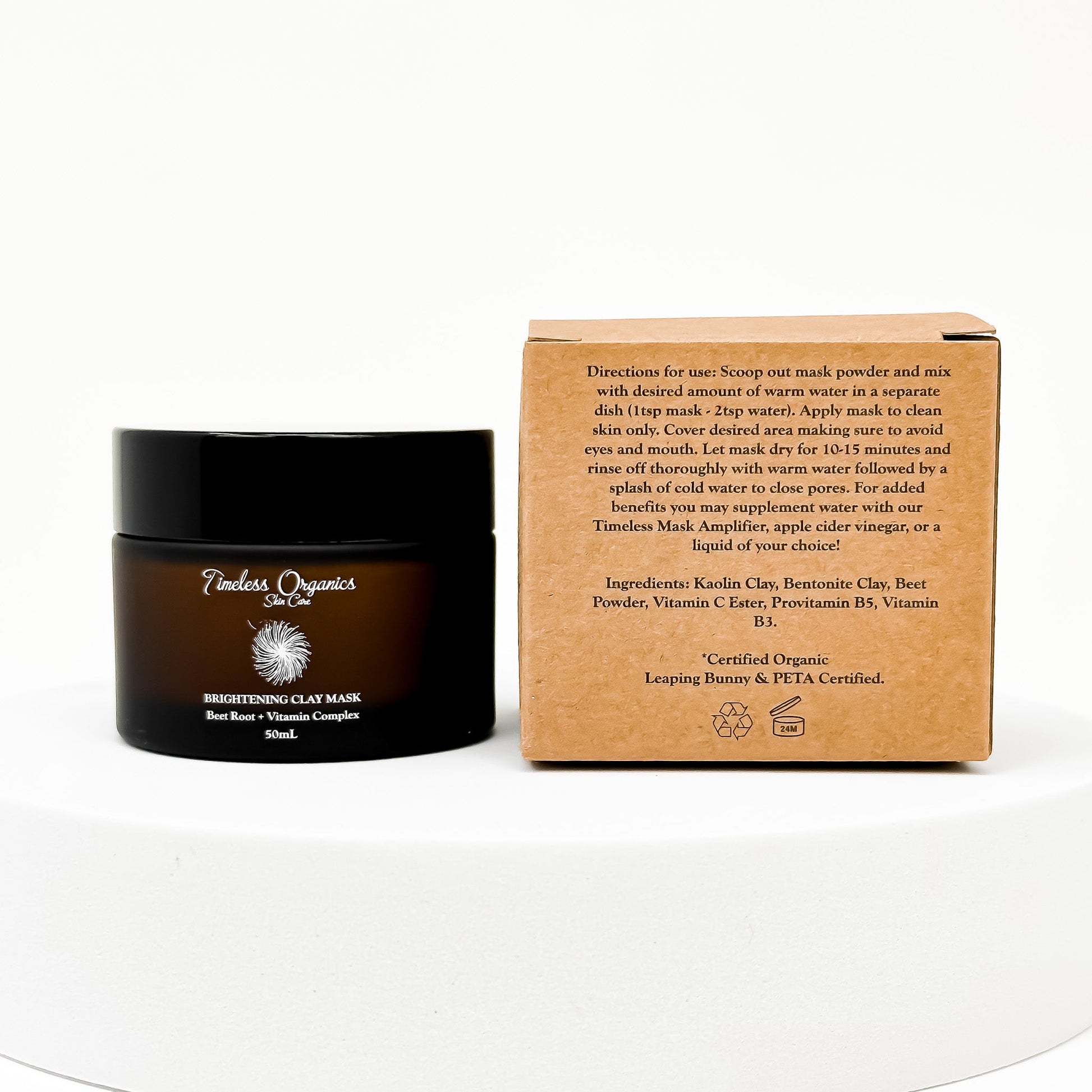 Brightening clay face mask jar with cardboard box, dark jar and brown box