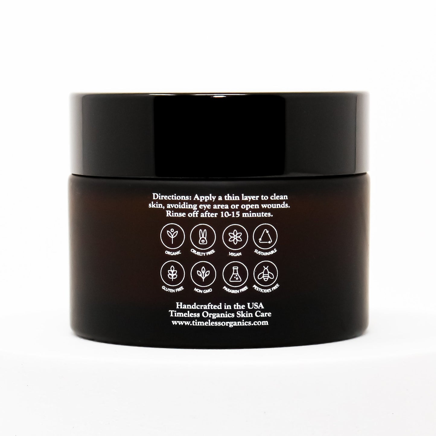 Timeless Organics clarifying masque jar with black lid, back label and directions