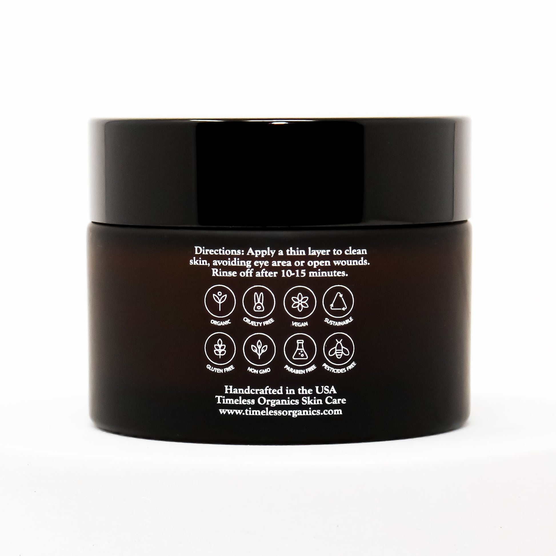 Timeless Organics clarifying masque jar with black lid, back label and directions