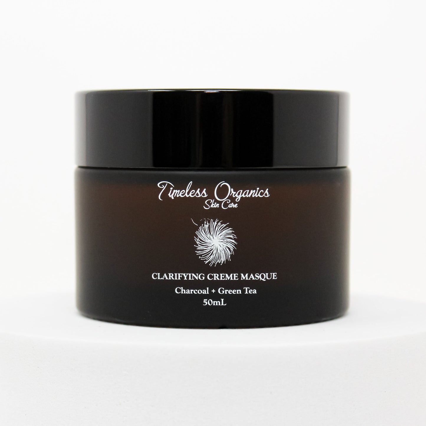 Timeless Organics clarifying charcoal cream masque jar with black lid, front label visible