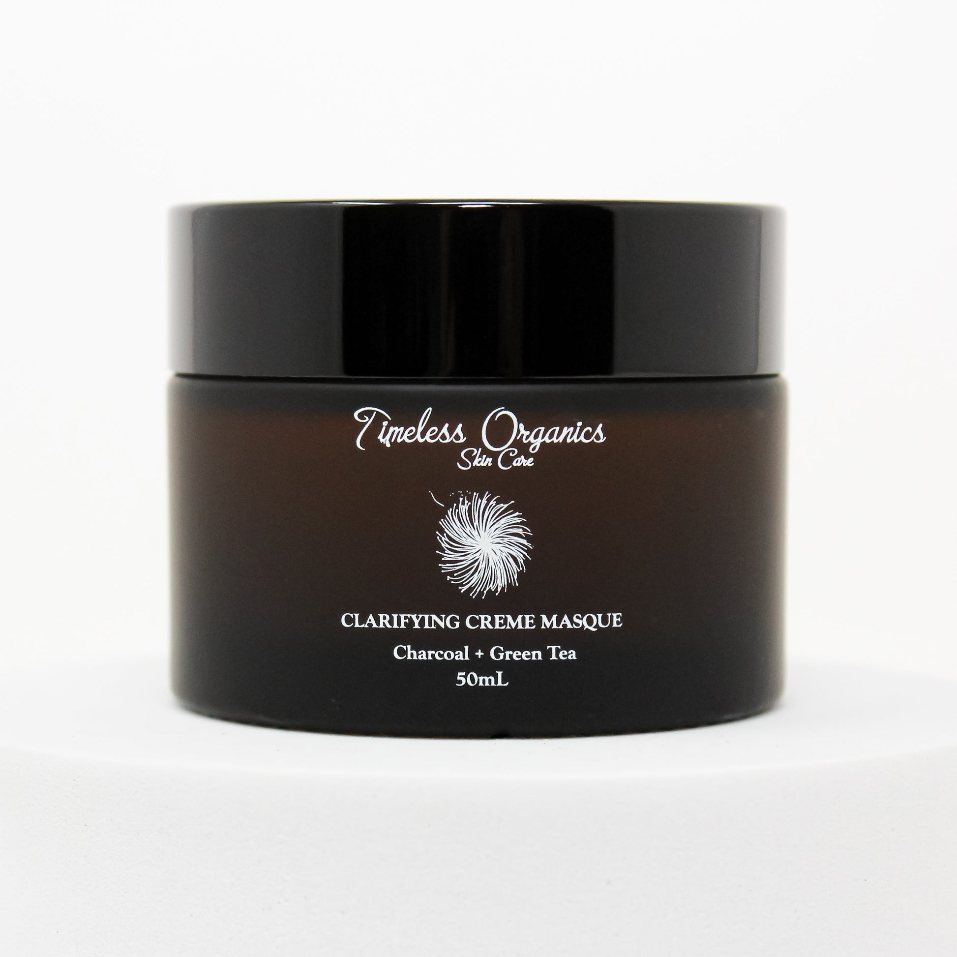 Timeless Organics clarifying charcoal cream masque jar with black lid, front label visible