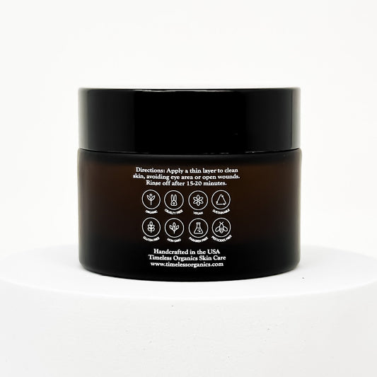 Black clay face mask jar with back label instructions and icon seals