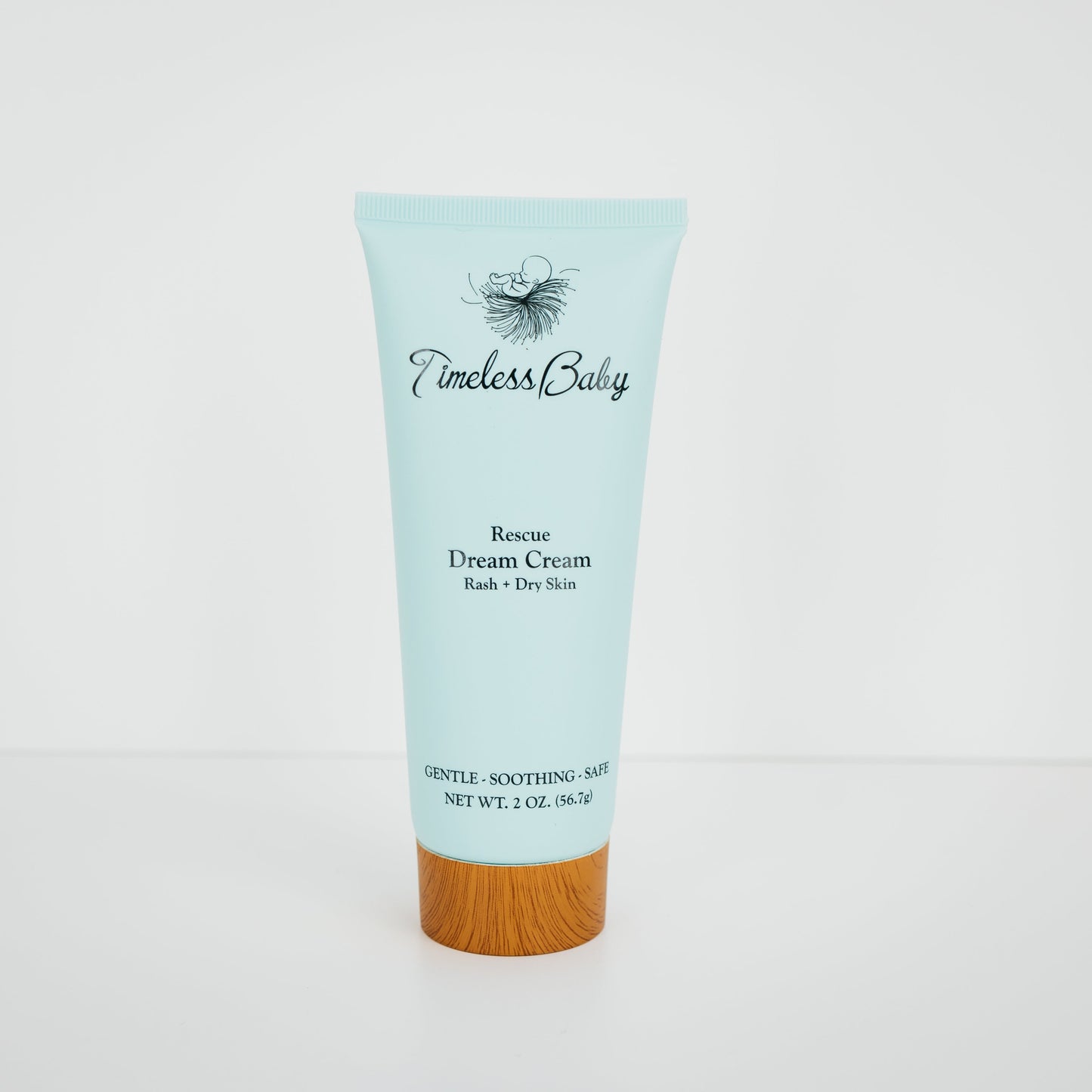 Timeless Baby Rescue Dream Cream moisturizer tube, light blue with wood cap, 2 oz