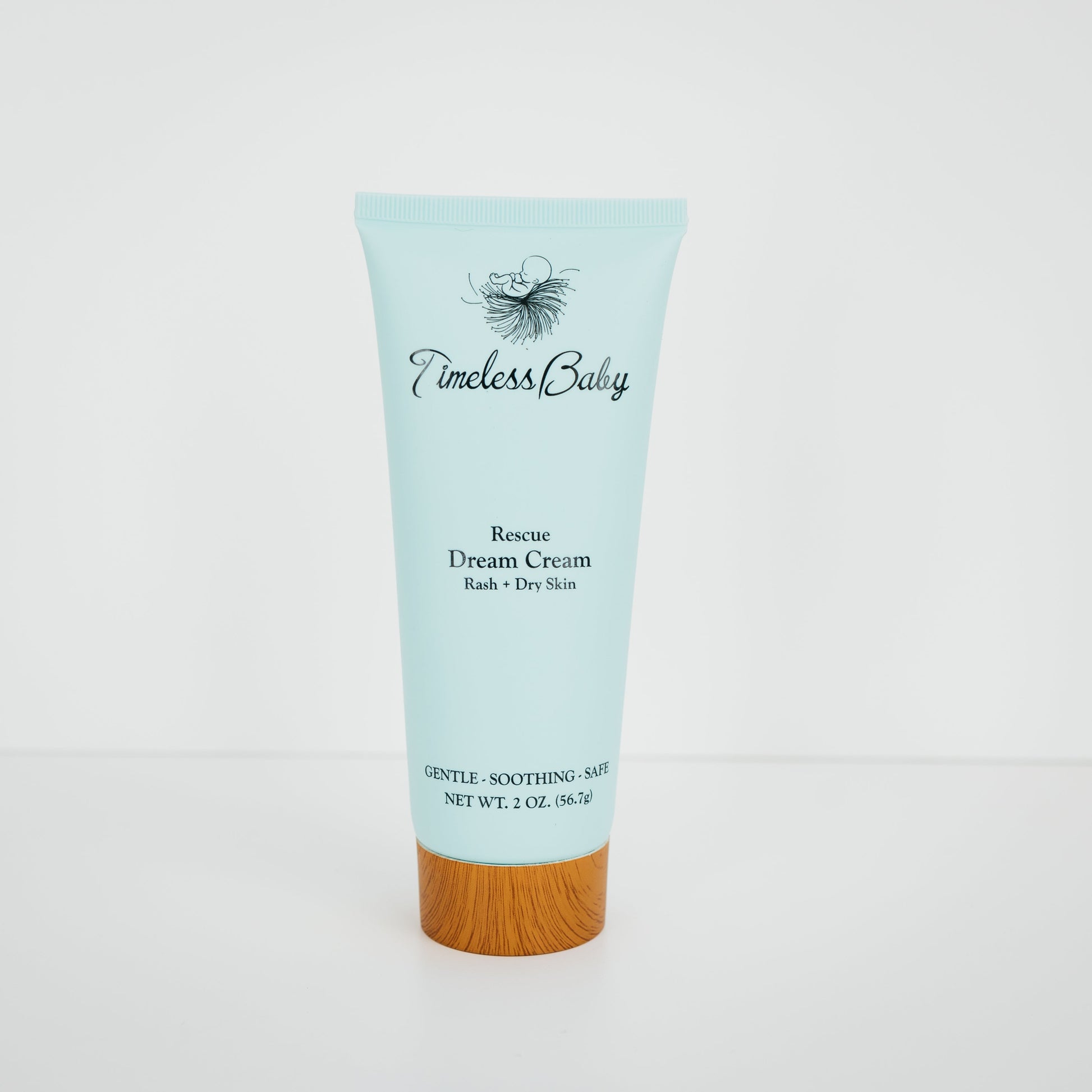 Timeless Baby Rescue Dream Cream moisturizer tube, light blue with wood cap, 2 oz