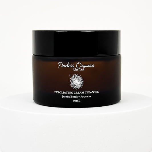 Timeless Organics exfoliating cream cleanser jar, black lid and amber-brown body