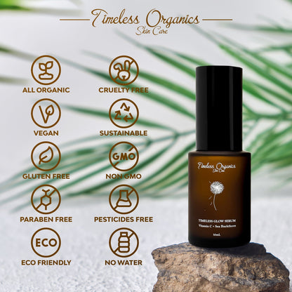 Glow serum bottle with black pump standing on a stone with green leaves.