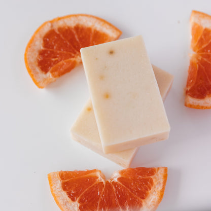 Clarifying bar soap, light cream with small speckles