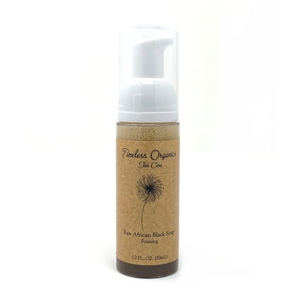 Foaming cleanser bottle of Timeless Organics Raw African Black Soap, brown with white pump.