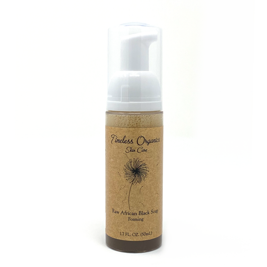 Foaming cleanser bottle of Timeless Organics Raw African Black Soap, brown with white pump.