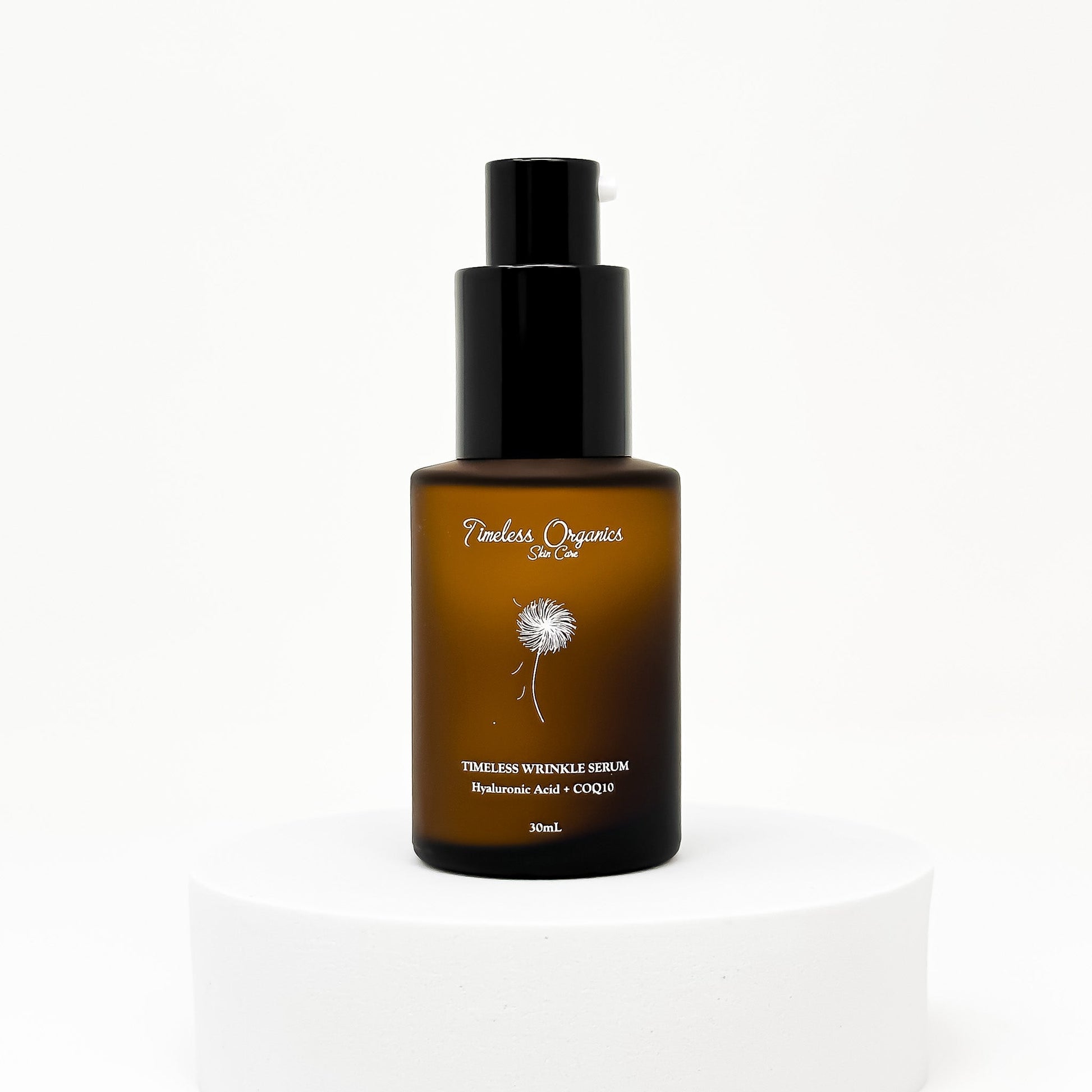 Nighttime wrinkle repair serum bottle with amber liquid and black pump dispenser
