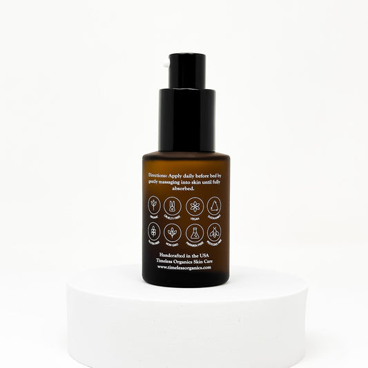 Nighttime wrinkle repair serum bottle with back label and amber liquid, black pump