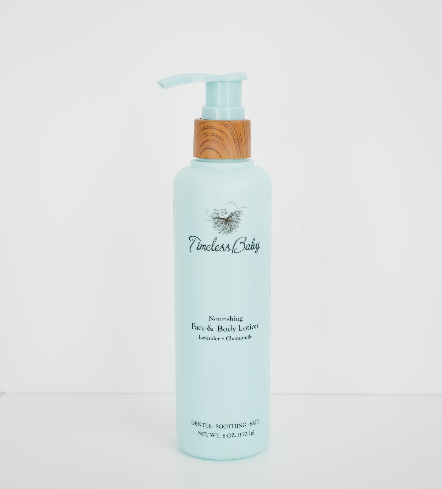 Baby face and body lotion bottle, light blue with pump, lavender and chamomile label.