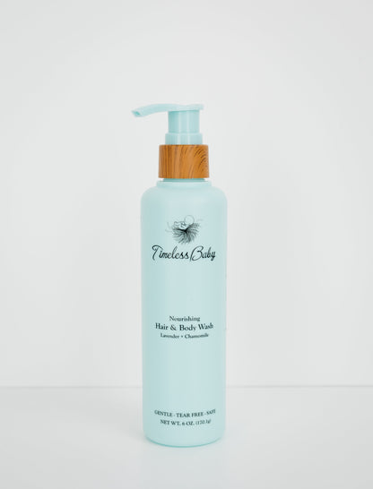 Light blue baby hair & body wash bottle with wooden pump and flip-top dispenser