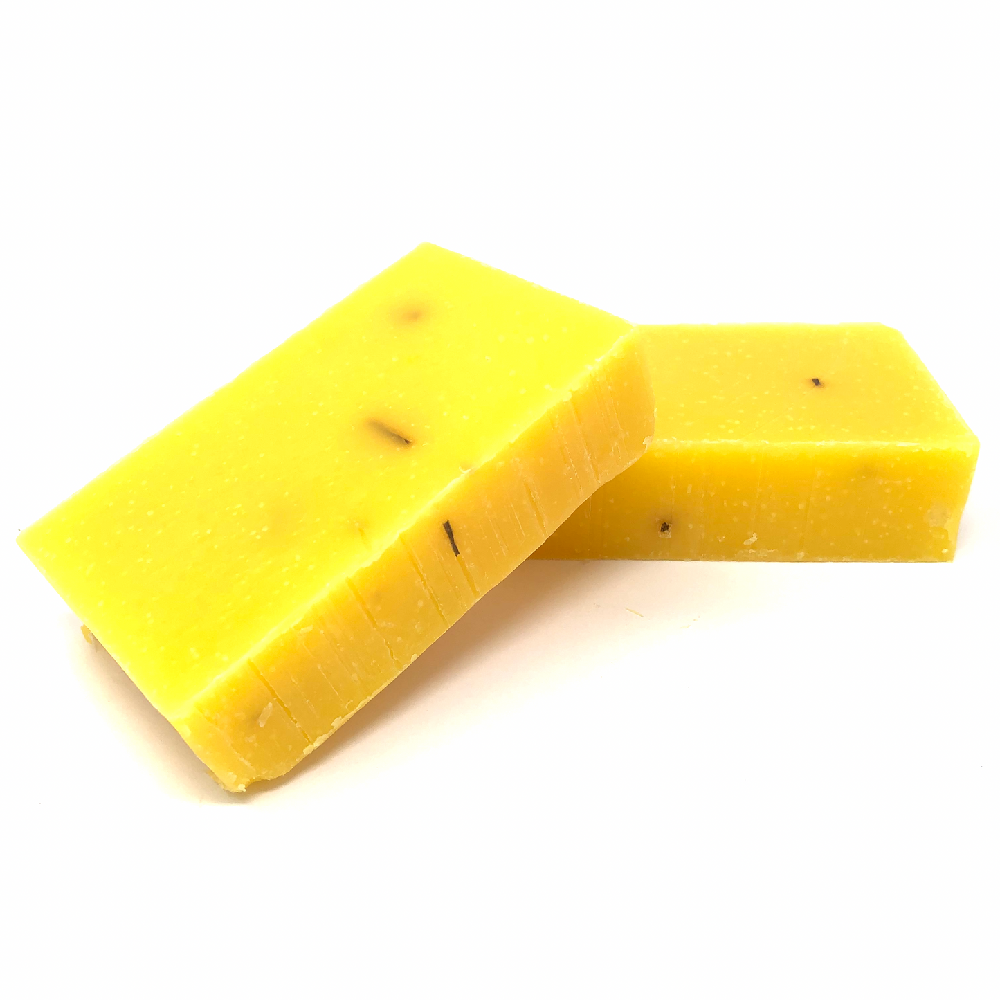 Anti-aging bar soap, yellow-gold with visible specks, cut block bars