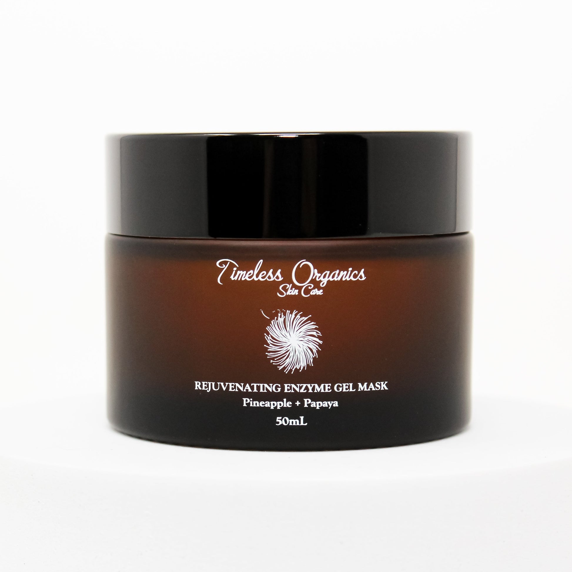 Rejuvenating enzyme gel face mask jar with dark cap, brown glass, brand logo