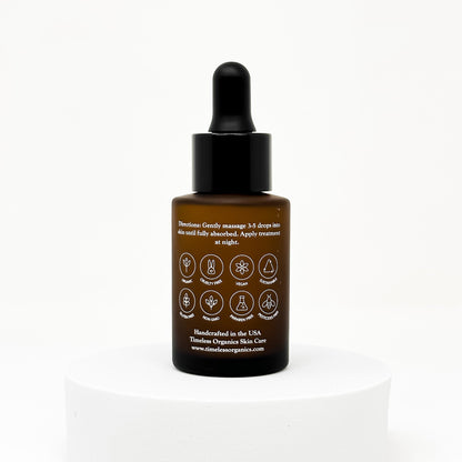 Retinol treatment serum bottle with black dropper cap and back label