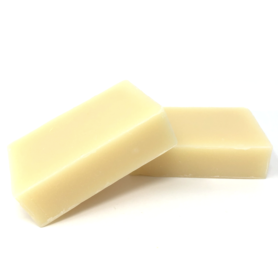 Exfoliating bar soap, pale yellow with salt-like specks, two bars