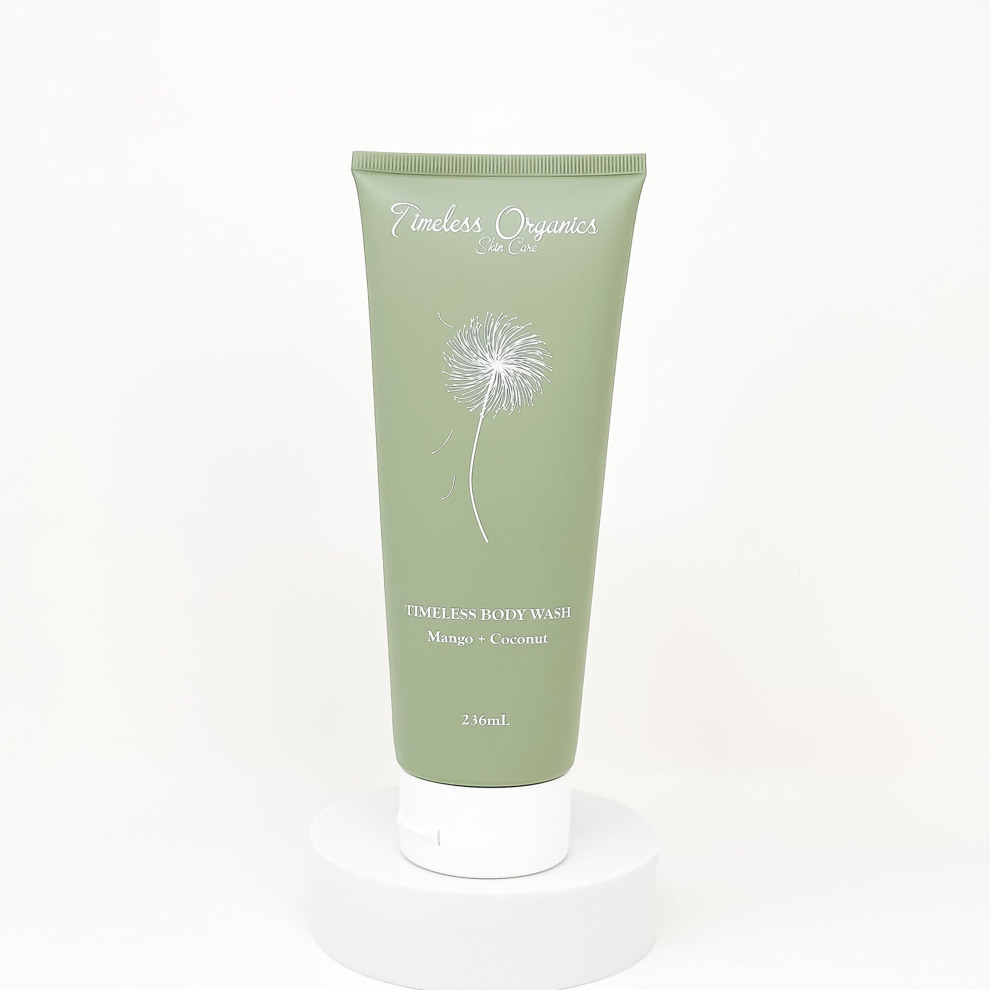 Timeless Organics body wash tube, light green with Mango + Coconut label