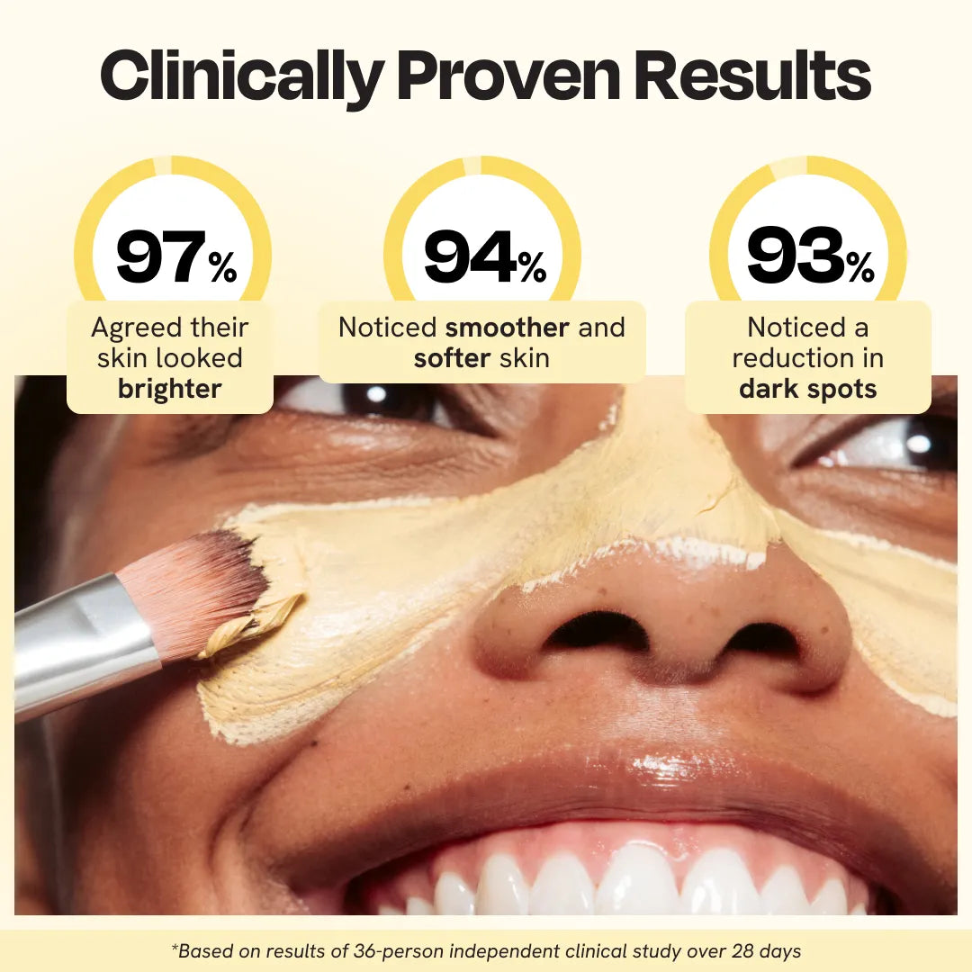 Vitamin C clay mask cream spread on face with an applicator brush